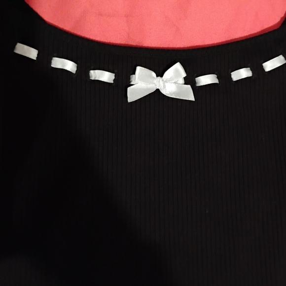 Liz And Sara Elegant Black Mini Dress with White Bow And Stitching Accents. - Picture 8 of 11